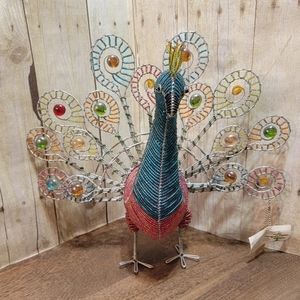 Peacock glass beads and wire figure